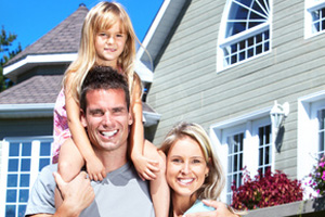 Family infront of their Home